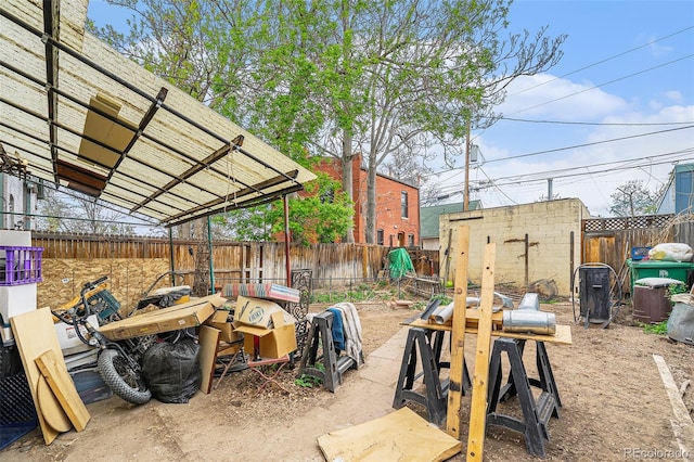 2350 N Ogden St, Denver, CO 80205 - fenced backyard featuring an outbuilding