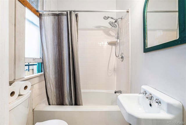 2350 N Ogden St, Denver, CO 80205 - full bathroom with shower / tub combo with curtain, toilet, and a sink