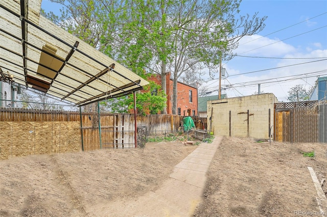 2350 N Ogden St, Denver, CO 80205 - view of yard featuring an outbuilding and fence
