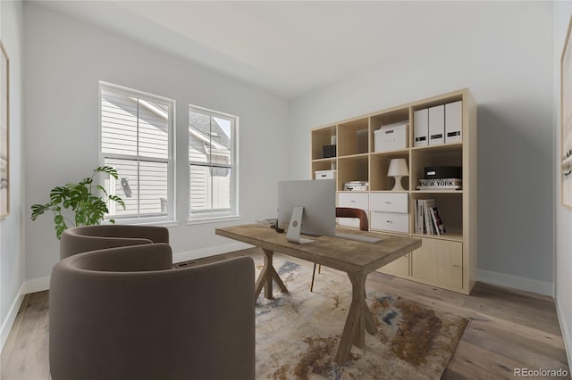 office area with light wood-type flooring