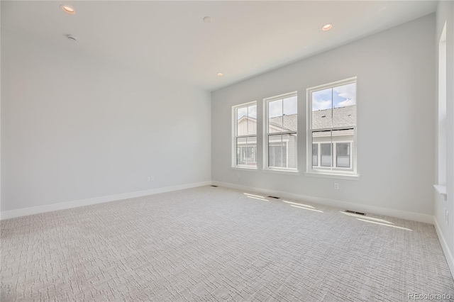 view of carpeted spare room