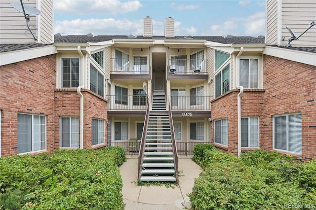 13873 E Lehigh Ave Unit C, Aurora, CO 80014 - view of property featuring stairway