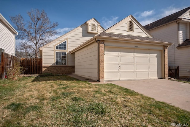 12977 W Dorado Pl, Littleton, CO 80127 - view of front of property with brick siding, a garage, driveway, and roof with shingles
