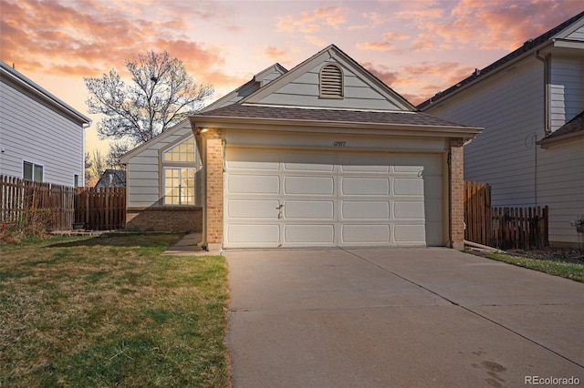12977 W Dorado Pl, Littleton, CO 80127 - garage featuring concrete driveway