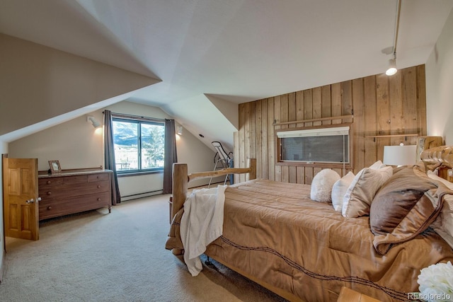 311 Longs Rd, Silverthorne, CO 80498 - carpeted bedroom featuring wooden walls, lofted ceiling, and a baseboard radiator