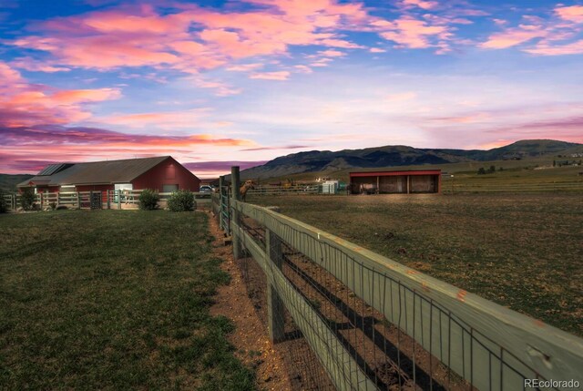 311 Longs Rd, Silverthorne, CO 80498 - view of yard with a mountain view, a pole building, an outdoor structure, and a view of countryside