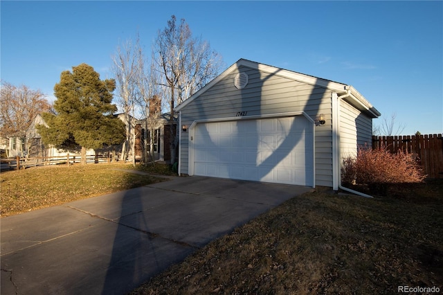 garage with a lawn