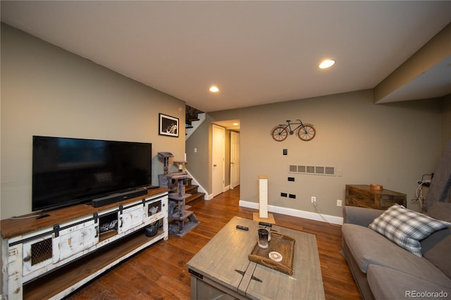 living room featuring dark hardwood / wood-style floors