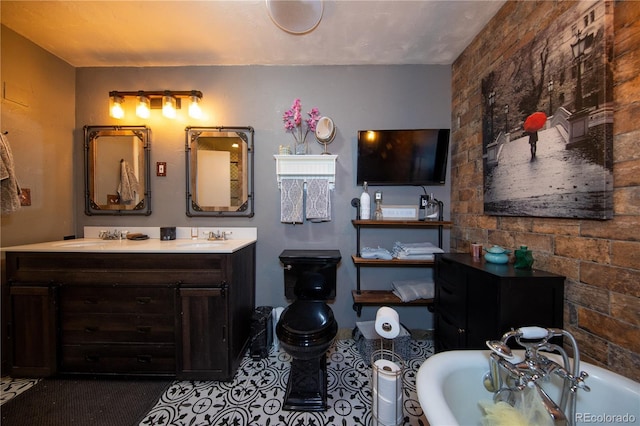 bathroom featuring vanity and a tub to relax in