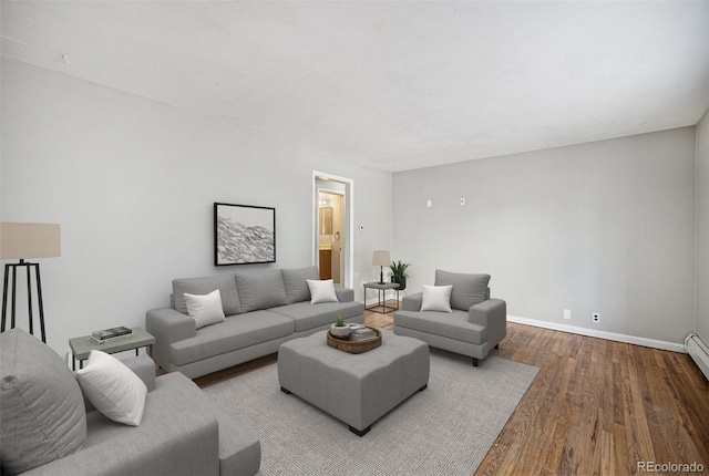 living room with wood finished floors and baseboards