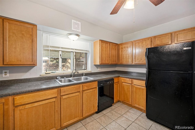 kitchen featuring visible vents, black appliances, a sink, dark countertops, and light tile patterned floors