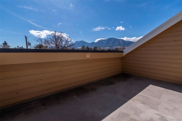 view of patio / terrace with a mountain view