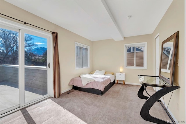 bedroom featuring baseboards, carpet, beam ceiling, and access to outside