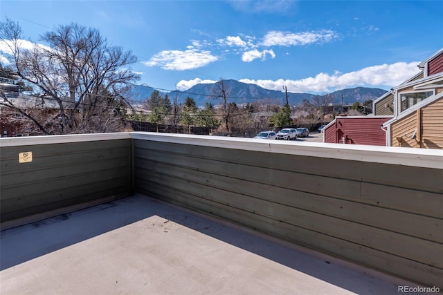 balcony featuring a mountain view