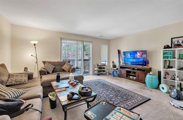 living area with carpet flooring