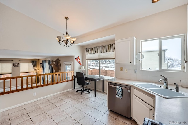 kitchen featuring white cabinetry, dishwasher, sink, an inviting chandelier, and pendant lighting