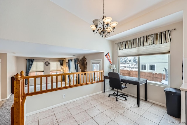 office area with light tile patterned floors and an inviting chandelier