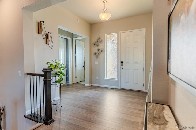 foyer entrance featuring light wood-type flooring