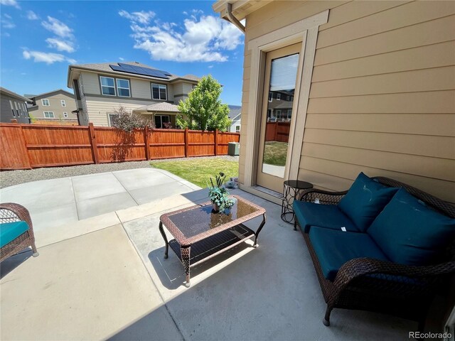425 W 128th Dr, Westminster, CO 80234 - fenced backyard with a patio area, a residential view, and an outdoor hangout area