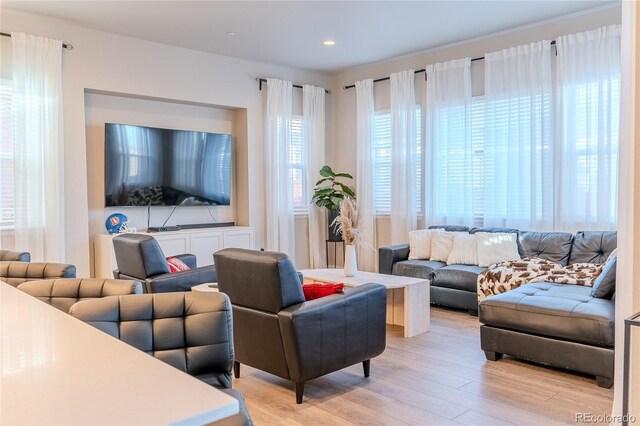425 W 128th Dr, Westminster, CO 80234 - living area with light wood-style flooring and recessed lighting