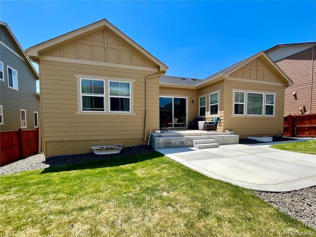 425 W 128th Dr, Westminster, CO 80234 - rear view of house with a patio and board and batten siding