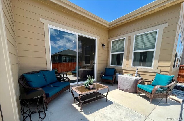 425 W 128th Dr, Westminster, CO 80234 - view of patio / terrace with an outdoor living space