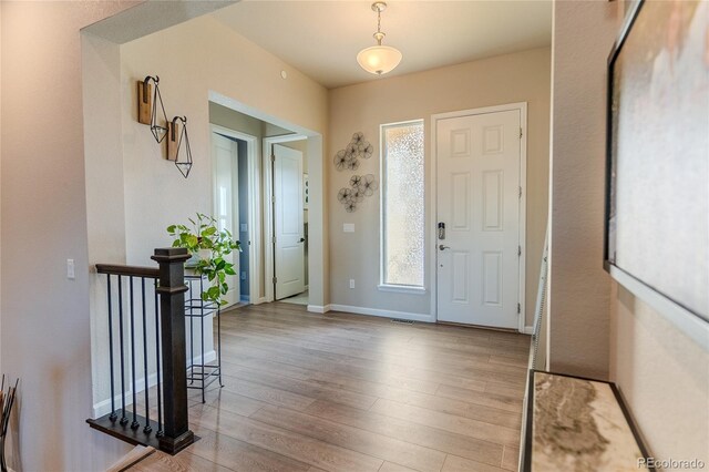 425 W 128th Dr, Westminster, CO 80234 - entrance foyer with wood finished floors and baseboards