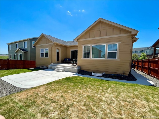 425 W 128th Dr, Westminster, CO 80234 - back of house with a patio area and board and batten siding