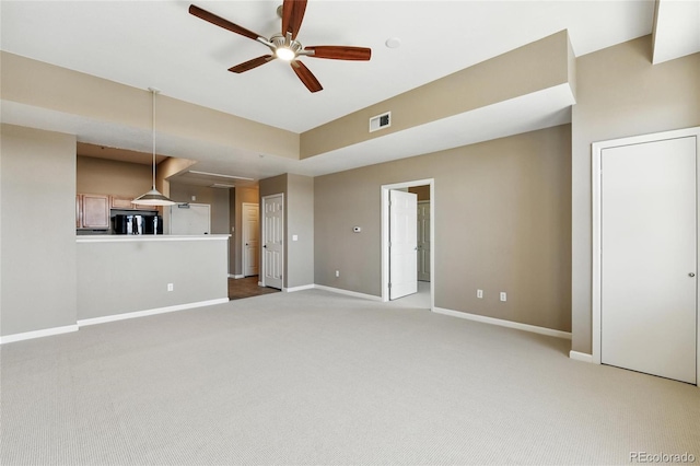 7931 W 55th Ave Unit 105, Arvada, CO 80002 - unfurnished living room featuring carpet flooring and a ceiling fan