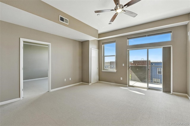 7931 W 55th Ave Unit 105, Arvada, CO 80002 - carpeted empty room featuring baseboards and a ceiling fan