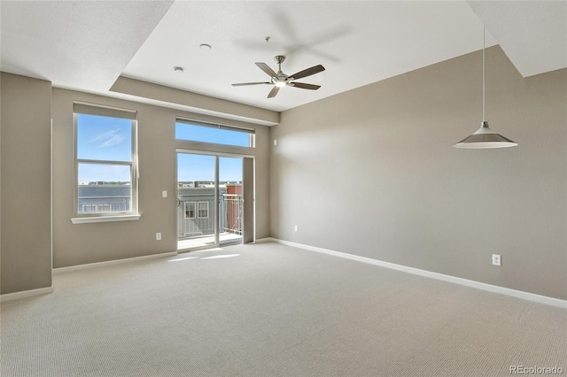 7931 W 55th Ave Unit 105, Arvada, CO 80002 - spare room with a ceiling fan and carpet flooring