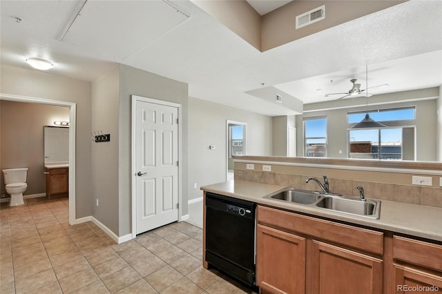 7931 W 55th Ave Unit 105, Arvada, CO 80002 - kitchen featuring dishwasher, light tile patterned flooring, light countertops, and a ceiling fan
