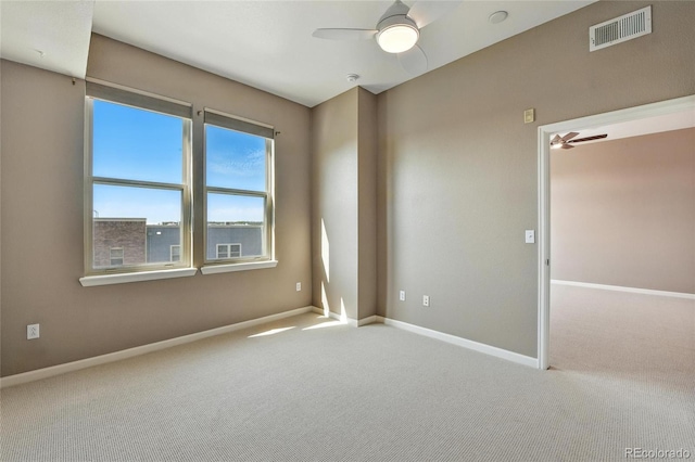 7931 W 55th Ave Unit 105, Arvada, CO 80002 - empty room with a ceiling fan, carpet, and a smoke detector