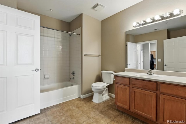 7931 W 55th Ave Unit 105, Arvada, CO 80002 - bathroom featuring vanity, tub / shower combination, and tile patterned floors