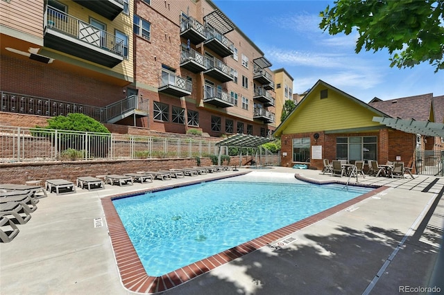 7931 W 55th Ave Unit 105, Arvada, CO 80002 - community pool featuring a patio