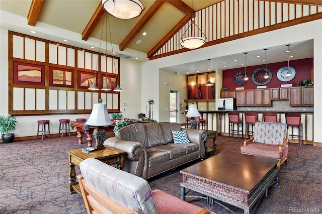 7931 W 55th Ave Unit 105, Arvada, CO 80002 - living area with high vaulted ceiling, beamed ceiling, and carpet flooring