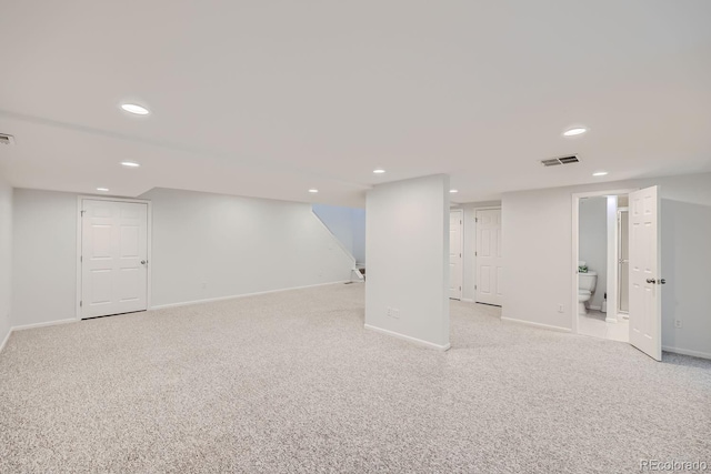 basement with light carpet