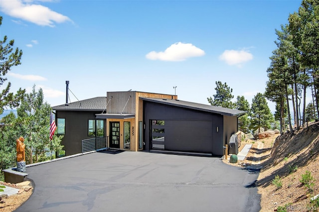 555 Sunrise Peak Rd, Manitou Springs, CO 80829 - view of front of house featuring a garage