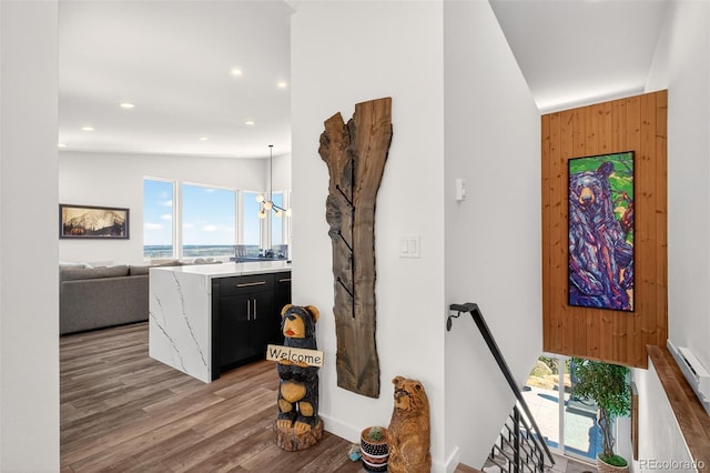 555 Sunrise Peak Rd, Manitou Springs, CO 80829 - corridor featuring an upstairs landing, light wood-style flooring, and recessed lighting