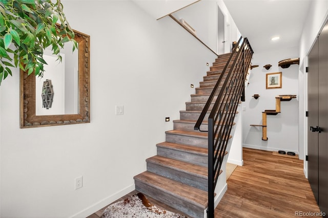 555 Sunrise Peak Rd, Manitou Springs, CO 80829 - stairs with recessed lighting and wood finished floors