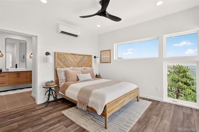 555 Sunrise Peak Rd, Manitou Springs, CO 80829 - bedroom featuring a wall mounted air conditioner, multiple windows, recessed lighting, wood finished floors, and a ceiling fan