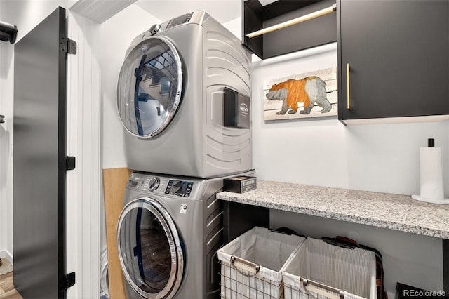 555 Sunrise Peak Rd, Manitou Springs, CO 80829 - washroom with stacked washer and clothes dryer