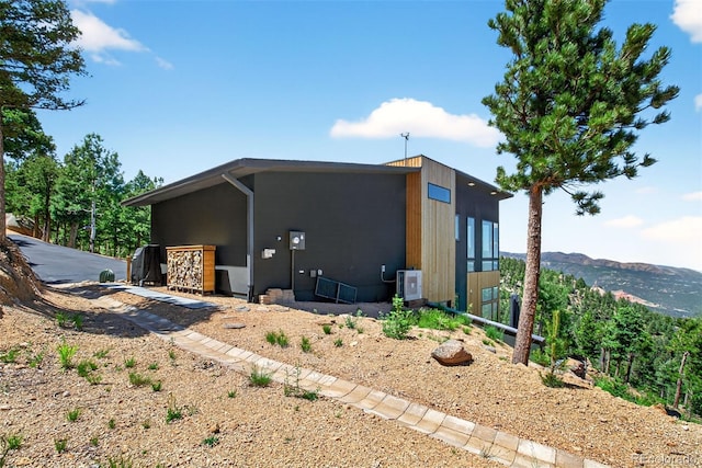 555 Sunrise Peak Rd, Manitou Springs, CO 80829 - rear view of property with a mountain view
