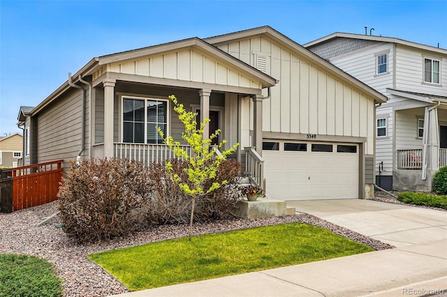 3548 Swabuck Pl, Castle Rock, CO 80109 - view of front of home with driveway, board and batten siding, a porch, and a garage