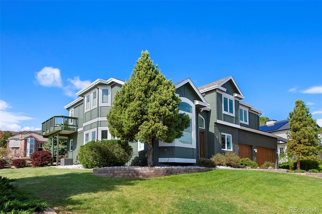 25 Sand Cherry, Littleton, CO 80127 - view of front of home with a front yard and a balcony