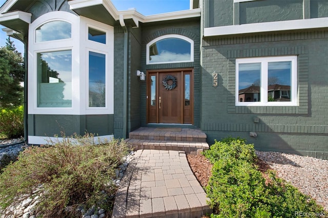 25 Sand Cherry, Littleton, CO 80127 - view of exterior entry featuring brick siding