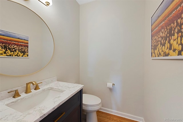 25 Sand Cherry, Littleton, CO 80127 - half bath with vanity and wood finished floors