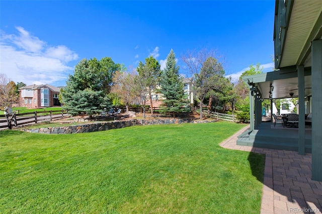 25 Sand Cherry, Littleton, CO 80127 - view of yard featuring ceiling fan and a patio area