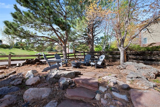 25 Sand Cherry, Littleton, CO 80127 - view of yard with an outdoor fire pit