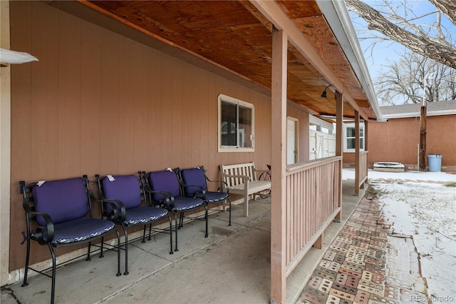 view of snow covered patio